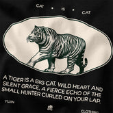 Yūjin Clothing Cat Is Cat T-Shirt featuring a playful cat graphic on a casual black cotton tee.