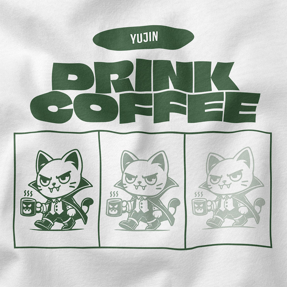 Yūjin Clothing Drink Coffee Cat T-Shirt featuring a playful cat graphic on a casual cotton t-shirt for coffee lovers.