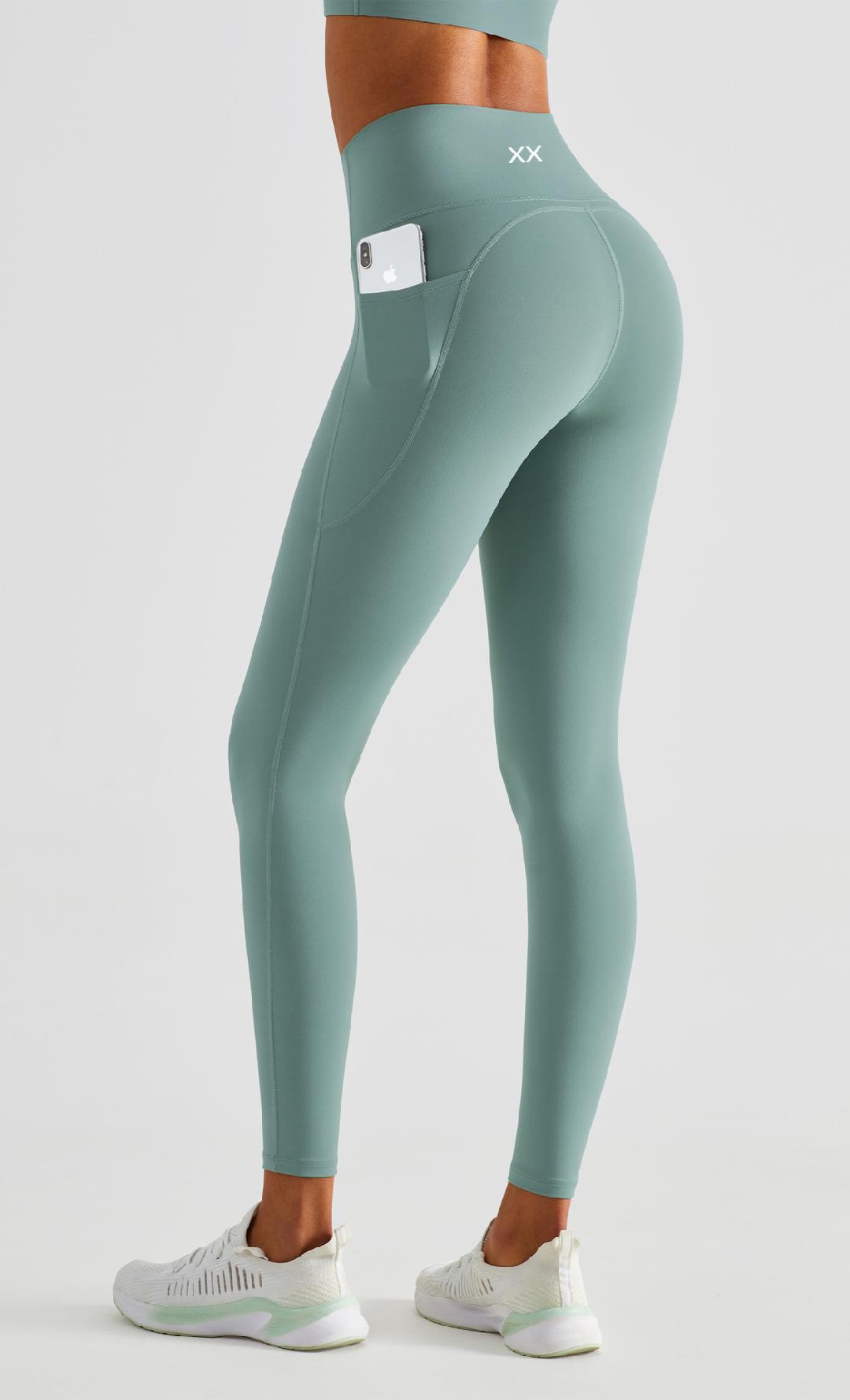 Seafoam green Koa Leggings by BLACKOUT BARBELL, showing the high-waisted athletic leggings with a snug fit and sleek design.