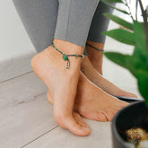 Silver emotional healing anklet by Conscious Items featuring delicate chain and charm with inspiring engraved message.