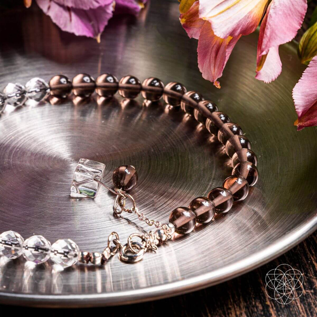 Silver Energy Shield Anklet by Conscious Items featuring a delicate chain and a small shield pendant around the ankle.