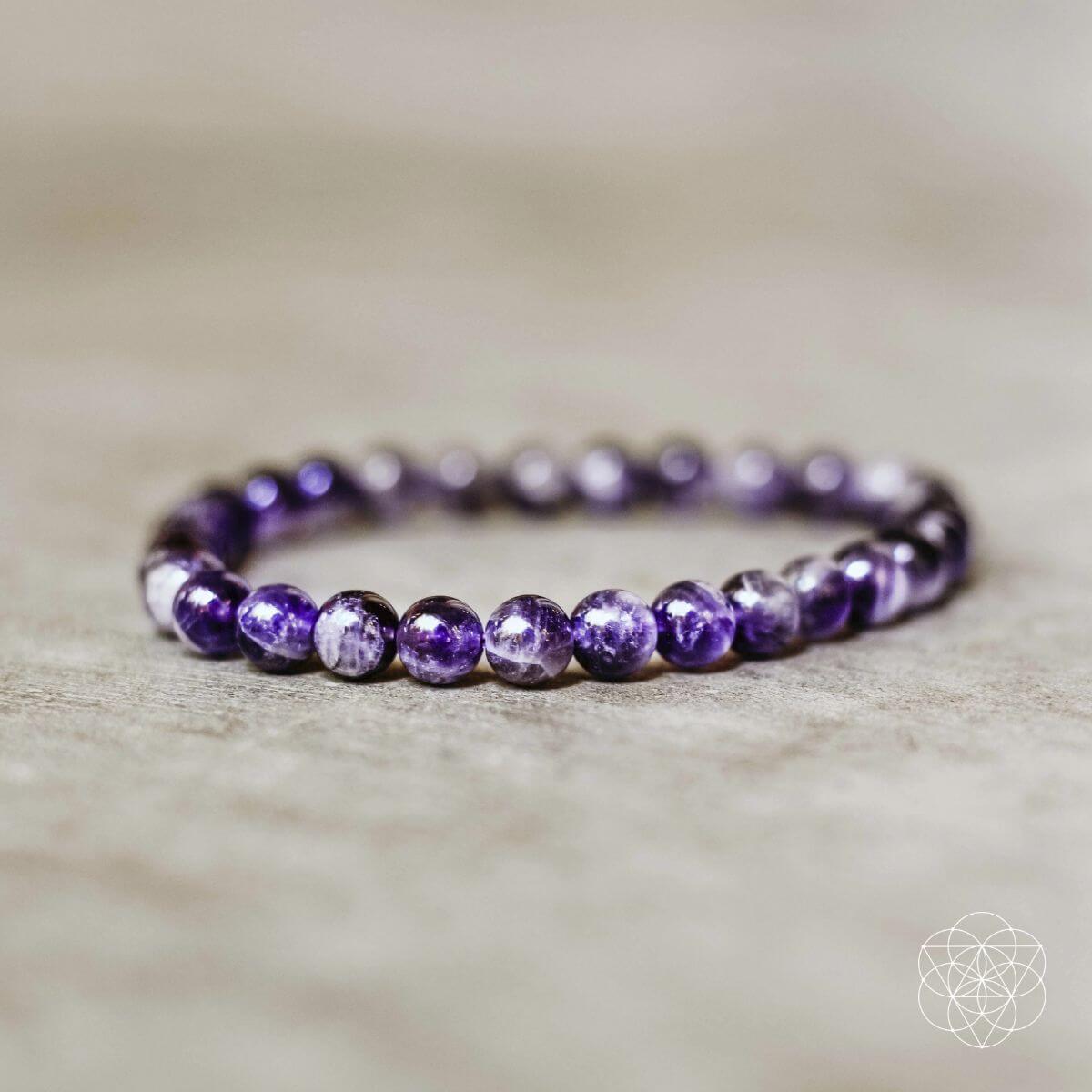 Conscious Items Purification Bracelet featuring natural beads and charm, designed for spiritual cleansing and stylish accessory.