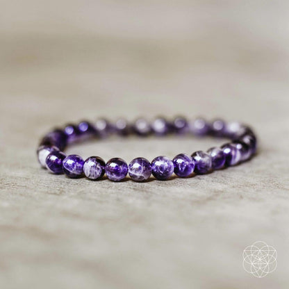 Conscious Items Purification Bracelet featuring natural beads and charm, designed for spiritual cleansing and stylish accessory.