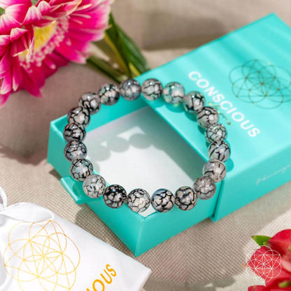 River agate bracelet from Conscious Items, featuring smooth, polished beads in calming earth tones, designed for stylish wear.