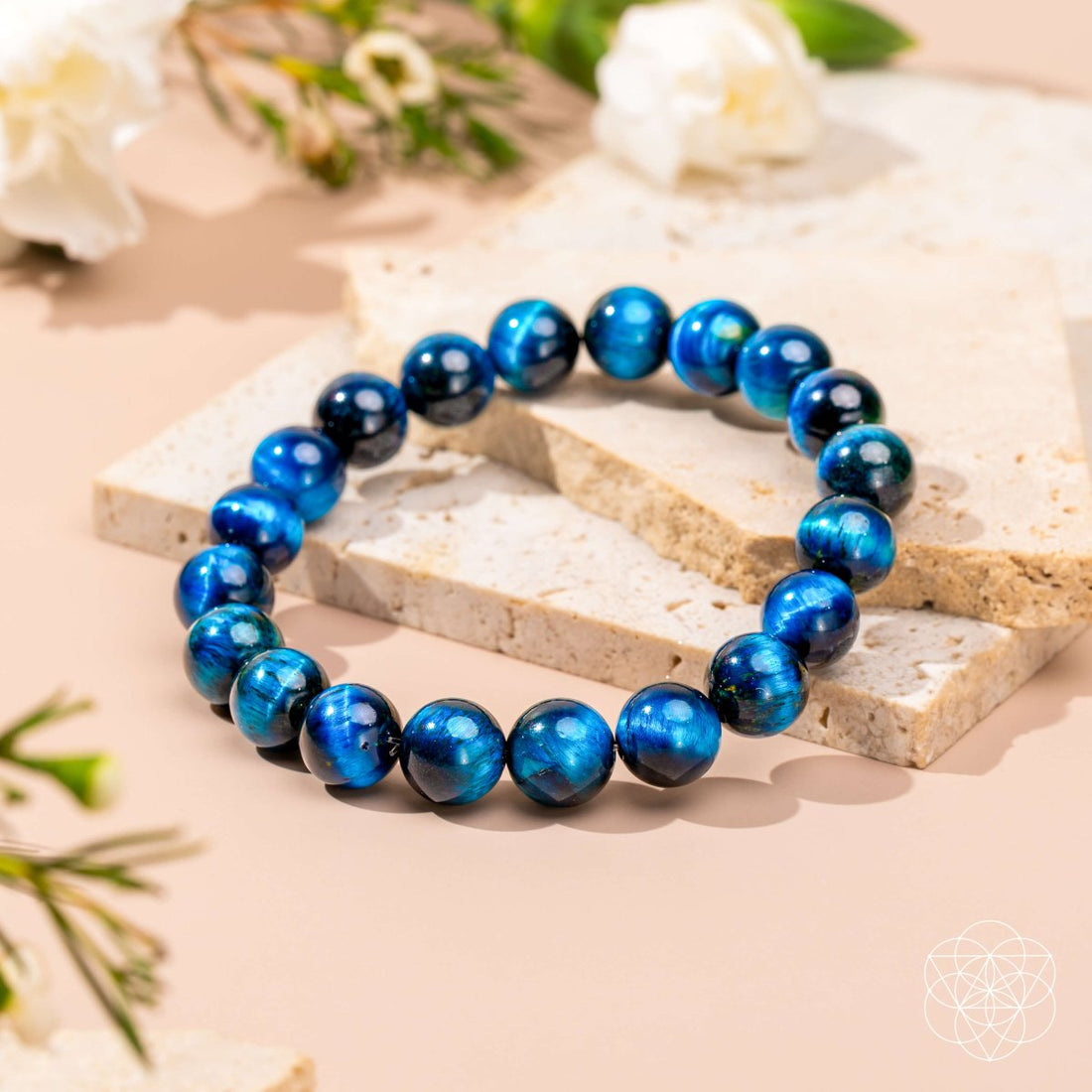 Royal blue Tiger’s Eye bracelet by Conscious Items featuring polished beads and a sleek elastic band.