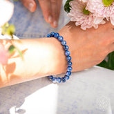 Conscious Items rare kyanite bracelet with polished blue gemstones and silver-tone clasp, designed for balance and spiritual energy.