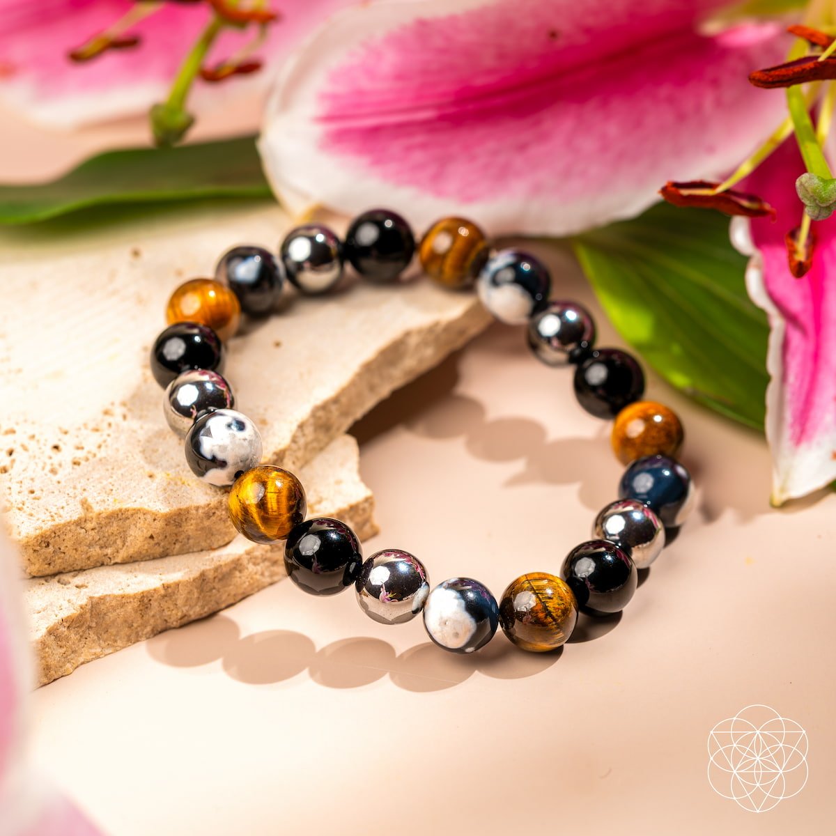 Orca’s Armor triple protection and healing bracelet by Conscious Items with black and silver beads and intricate design.