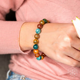 Ocean Jasper bracelet by Conscious Items featuring polished round stones on an elastic band for a calming, natural jewelry accessory.