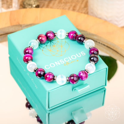 Pink Galaxy Tiger’s Eye bracelet by Conscious Items featuring polished beads and a celestial-inspired design.