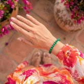Conscious Items Anxiety Bracelet featuring 6mm beads, displayed in a lifestyle setting on a wrist with natural lighting