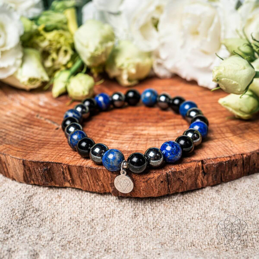 Conscious Items Energy-Shield Bracelet featuring a sleek metal band with intricate design details on a neutral background.