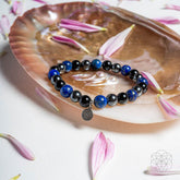 Conscious Items Energy-Shield Bracelet featuring a sleek design with beaded accents and adjustable strap for everyday wear.