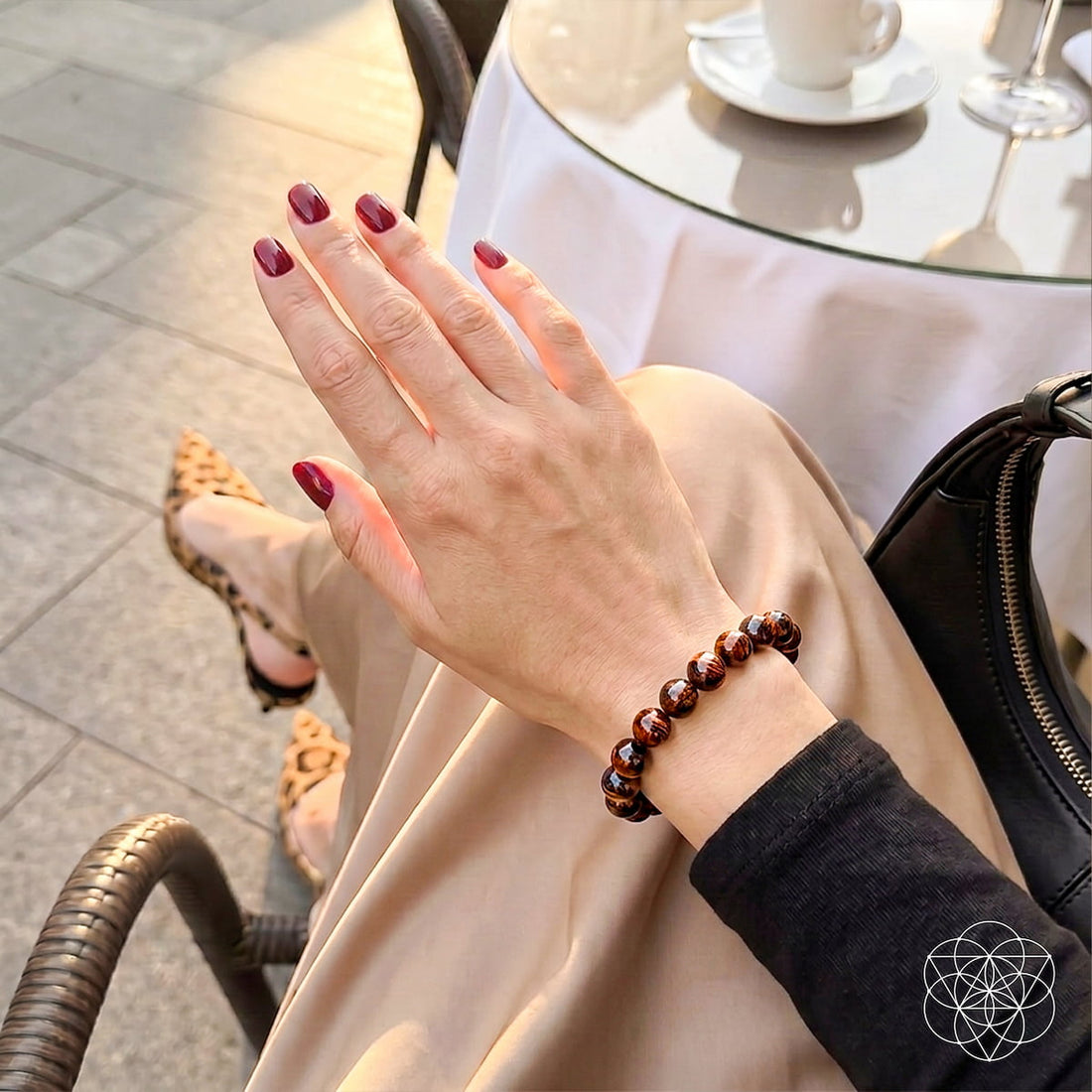 Mahogany Obsidian bracelet from Conscious Items featuring natural stones, worn as a stylish lifestyle accessory.