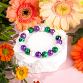 Conscious Items Triple Healing Bracelet featuring layered beaded design with natural stones and adjustable cord for wrist comfort.
