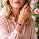 Unshakeable Intuition Siberian Charoite bracelet by Conscious Items worn on wrist in a lifestyle setting.