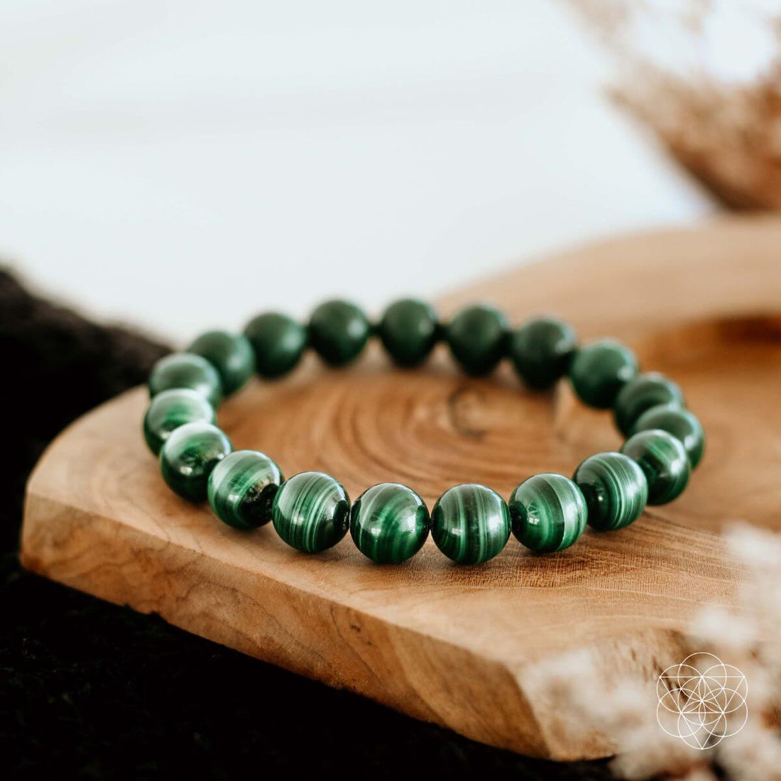 Conscious Items The Anxiety Bracelet featuring a simple, adjustable bracelet with calming beads and a motivational charm.