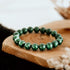 Conscious Items The Anxiety Bracelet featuring a simple, adjustable bracelet with calming beads and a motivational charm.