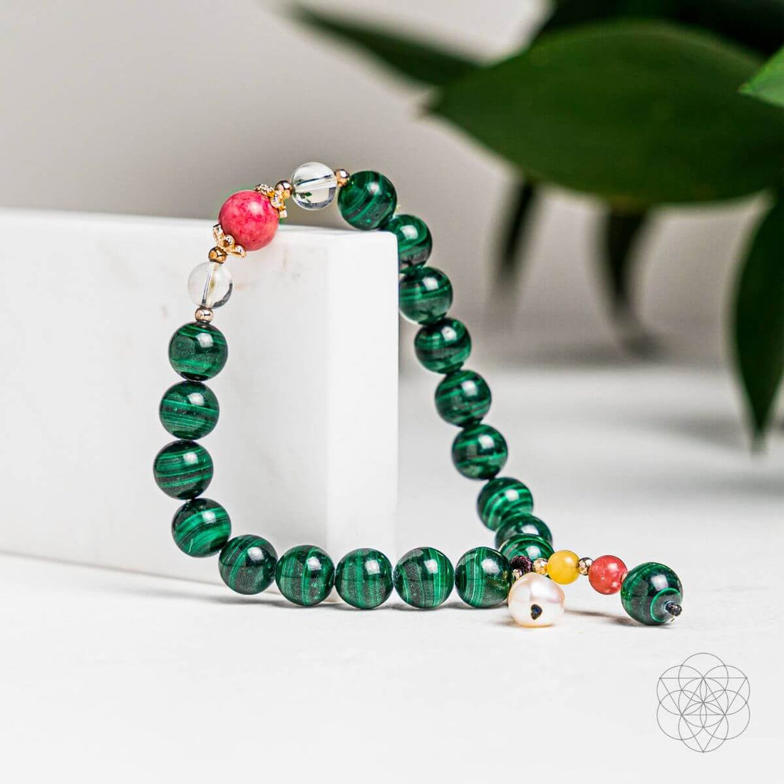 Close-up of the Law of Attraction bracelet by Conscious Items, featuring sleek design and adjustable cord on a neutral background.