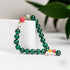 Close-up of the Law of Attraction bracelet by Conscious Items, featuring sleek design and adjustable cord on a neutral background.
