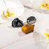 Three decorative home ornaments from the Triple Protection Trio by Conscious Items, featuring unique designs and natural finishes.
