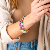 Crystal Quartet Bracelet Set from Conscious Items featuring polished gemstones on a delicate jewelry set for manifestation and positive energy.