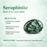 Seraphinite pendant necklace by Conscious Items featuring a polished green stone with silver veining, displayed on a chain.