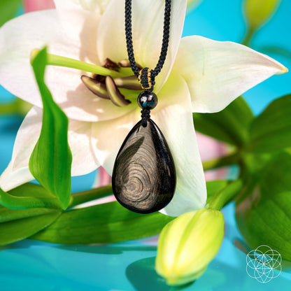 Hypersthene Millionaire Manifestation Pendant necklace by Conscious Items featuring a polished stone pendant on a silver chain.