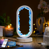 Clear quartz night light from Conscious Items called Manifest Success, featuring a glowing achievement-themed lamp for positive energy.