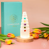 Conscious Items Stress Shield Lamp night light with 7 healing stones for calming and energy balance, illuminated in a cozy setting.