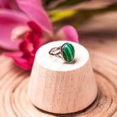 Conscious Items Heart-Healing Ring featuring a polished silver band with a heart-shaped charm for emotional well-being.