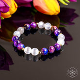 Galaxy Tiger’s Eye bracelet from Conscious Items, featuring cosmic energy amplifier design and polished tiger’s eye beads.