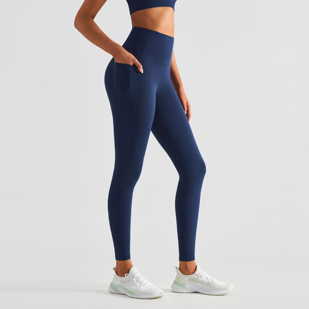 Blackout Barbell Koa Leggings in navy, featuring a snug fit and stretchy fabric, shown on a model for activewear and workout use.