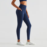 Blackout Barbell Koa Leggings in navy, featuring a snug fit and stretchy fabric, shown on a model for activewear and workout use.