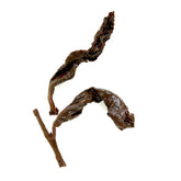 Dark roasted Taiwanese Oolong tea leaves from Rare Leaves Black Pearl, shown wet and lush in this close-up image.