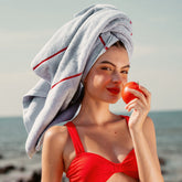 Deia Australian cotton bath towel by Italic in vibrant tomato red, soft and plush for home bathroom use.