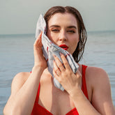 Deia Australian cotton towel by Italic, vibrant tomato red, soft, plush, and perfect for home or bed use.