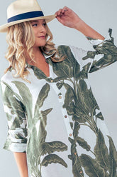 Fitkitty Culture tropical palm leaf button-down midi dress, perfect for resort and spring, with vibrant leaf print and relaxed fit.