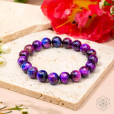 All-Galaxy Tiger’s Eye bracelet from Conscious Items, featuring polished stone beads and a celestial-inspired design.