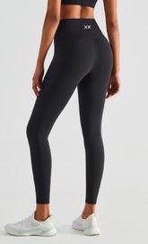 Black Koa Legging by BLACKOUT BARBELL in black fabric, form-fitting athletic leggings with a sleek design and comfortable fit.