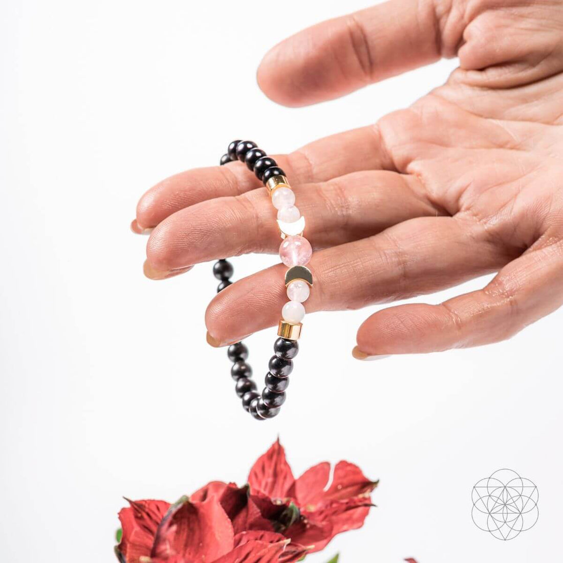 Shungite super charged bracelet from Conscious Items with black round beads on an elastic cord, designed for digital detox.