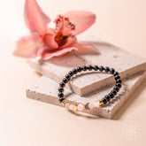 Shungite super charged bracelet from Conscious Items featuring black stone beads for digital detox and protection.