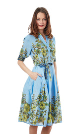 Light blue leaf-print dress by Dizzy-Lizzie featuring a Mrs. Maisel-inspired pattern, shown on a model.