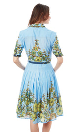 Light blue Mrs. Maisel dress by Dizzy-Lizzie featuring a leaves print, short sleeves, and a flowy, stylish design.
