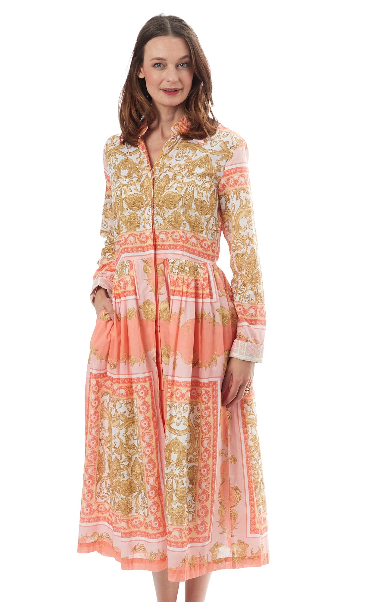 Dizzy-Lizzie tea length button-front dress with scroll print, showcasing a fitted waist and elegant hemline.
