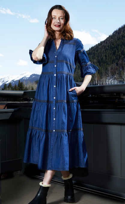 Dizzy-Lizzie Miami denim dress with black ribbon trim, sleeveless design and casual fit, shown on a model.