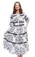 Dizzy-Lizzie Miami Style midi dress with flounce and black ribbons, featuring black and white paisley pattern.