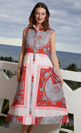 Dizzy-Lizzie Sea Island Dress in coral print featuring a stylish, lightweight dress with a vibrant tropical pattern.