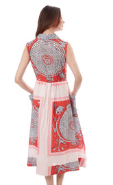 Sea Island Dress by Dizzy-Lizzie in coral print, showing lightweight fabric and stylish design perfect for warm weather.