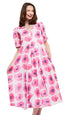 Pink Montauk Dress with Poppy Print by Dizzy-Lizzie, featuring a flowing fabric and floral pattern.