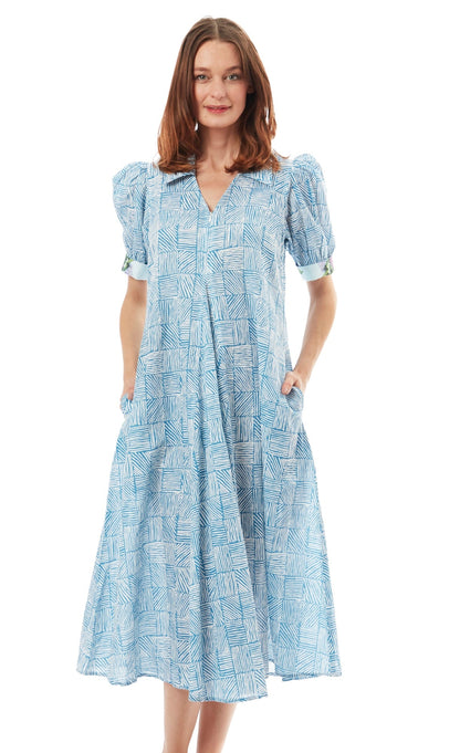 Turquoise and white criss-cross Montauk dress by Dizzy-Lizzie, featuring a flowing design and stylish pattern.